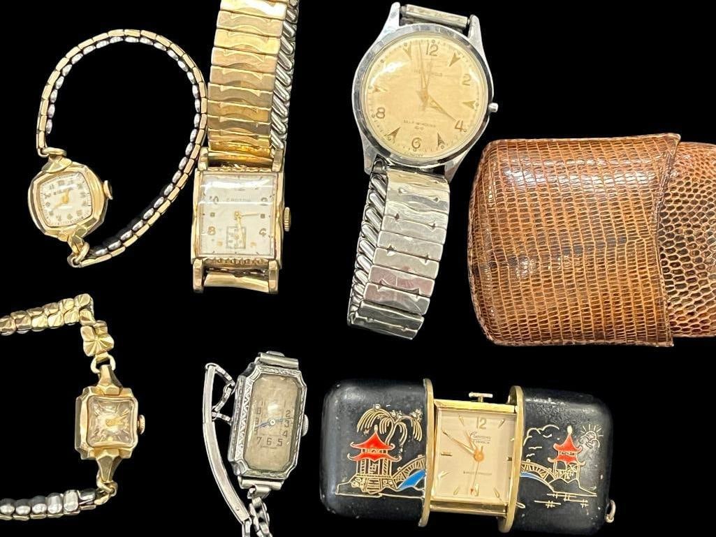 Wristwatches and Travel Clock: Wristwatches by Bulova, Croton, etc. Travel Clock by Canava . 6 pieces.