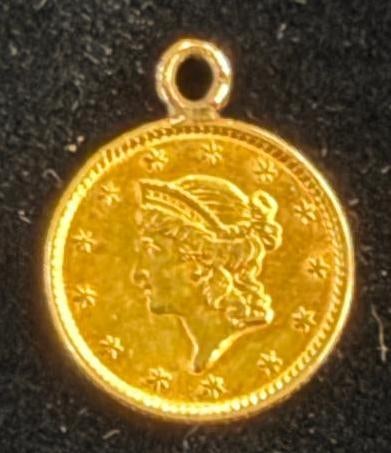 1852 $1 Gold Coin: 1852 $1 Gold Coin in bezel.