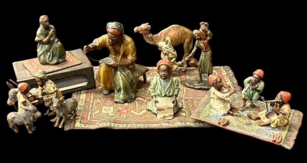 Austrian Cold Painted Bronze figurines: Austrian Cold Painted Bronze figurines. 8 pieces. Largest approx. 2.5 x 2 x 1.5 inches.