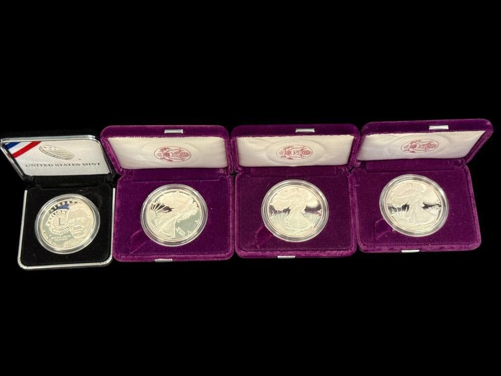 U.S. Silver Eagles and Lions Club Silver Dollar: U.S. Silver Eagles and 2017 Lions Clubs International Centennial Proof Silver Dollar. Eagles are years 1990, 1991 and 1992. 4 pieces total.
