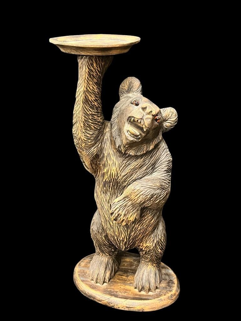 Black Forest carved wood bear plant stand: Black Forest carved wood bear plant stand. Approx. 28 x 13 x 9 inches.