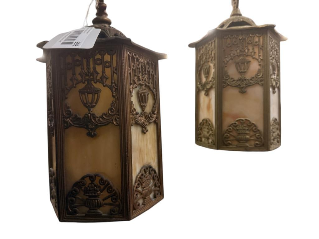 2 Hanging slag glass pendant lights: 2 Hanging slag glass pendant lights.