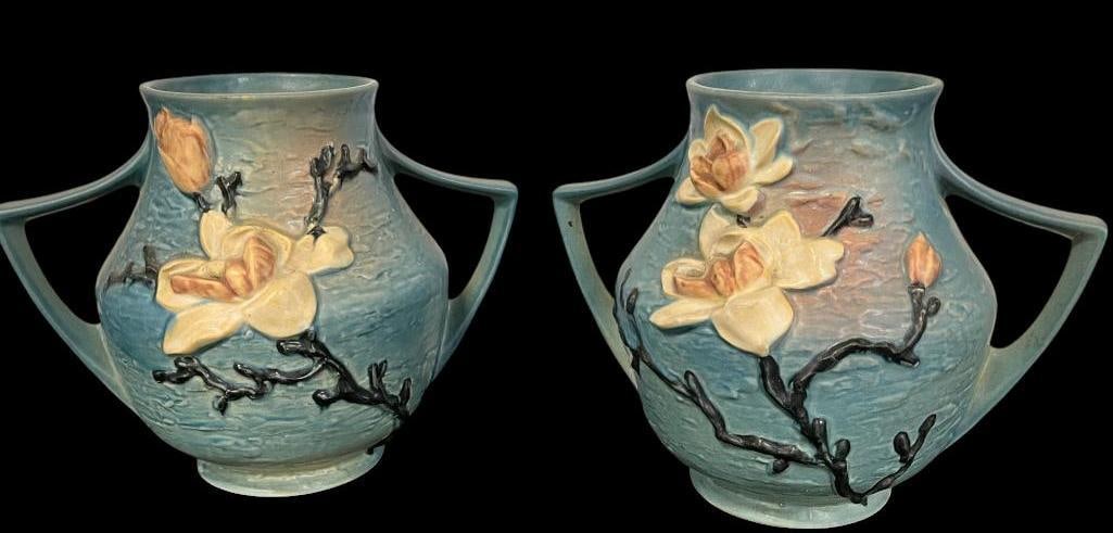 2 Roseville Pottery Magnolia Vases: 2 Roseville Pottery Magnolia Vases. Approx. 8.5 x 11 x 8 inches.