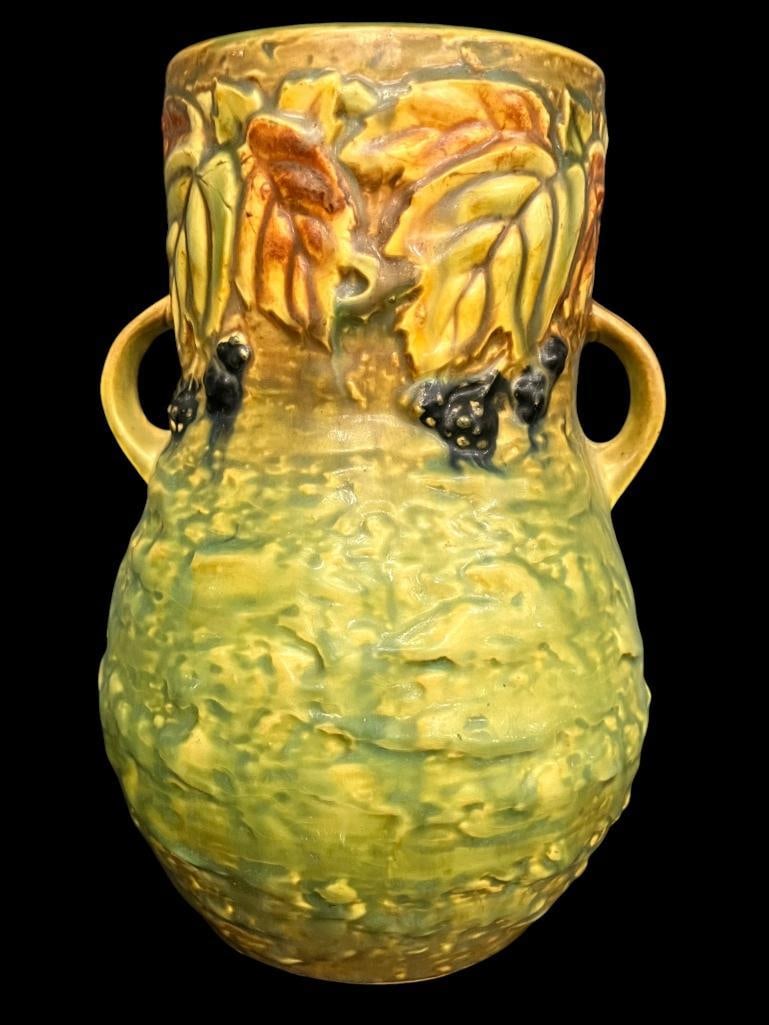 Roseville Pottery Blackberry Vase: Roseville Pottery Blackberry Vase. Approx. 8 x 5 x 5 inches.