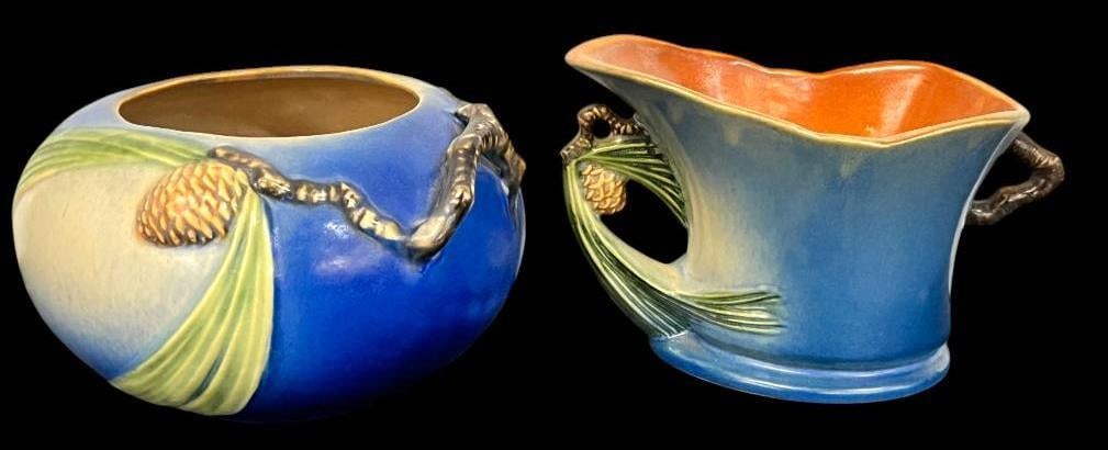 2 Roseville Pottery Pine Cone planters: 2 Roseville Pottery Pine Cone planters. Approx. 4 x 7 x 7 inches.