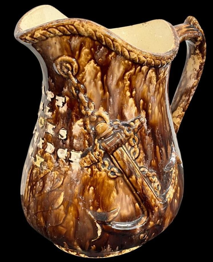 Bay View Pottery pitcher c. 1896: Bay View Pottery pitcher c. 1896. For Capt. G.L. Wicks Bay Ridge NY. Anchor design and has Frog inside. Approx. 11 x 9 x 6 inches.