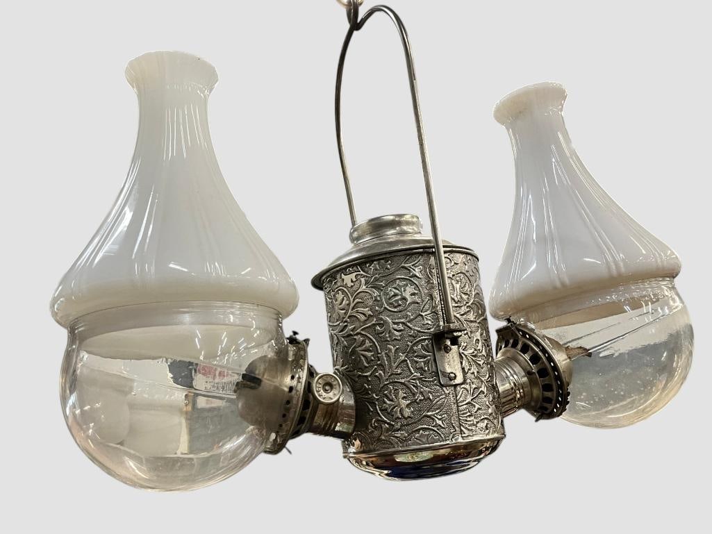 Double Hanging oil lamp: Double Hanging oil lamp. Has not been electrified. Approx. 17 x 20 x 8 inches.