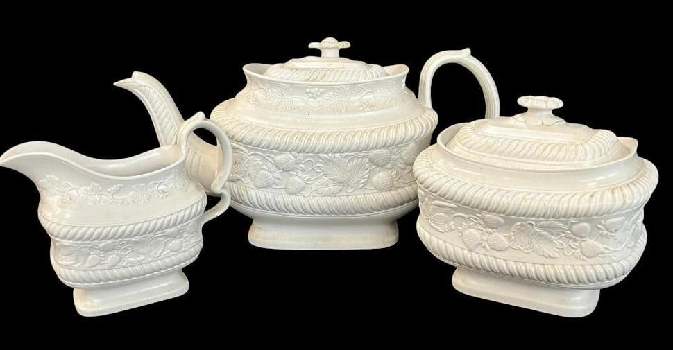Staffordshire Tea Set c. 1825: Staffordshire Tea Set c. 1825. White body with salt glaze. 3 pieces. Pot approx. 6 x 12 x 6 inches.