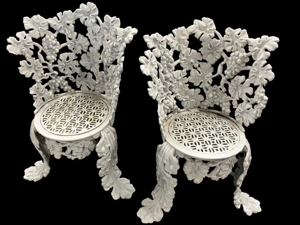 2 Cast Iron Garden Chairs: 2 Cast Iron Garden Chairs.Chairs approx. 30 inches tall.