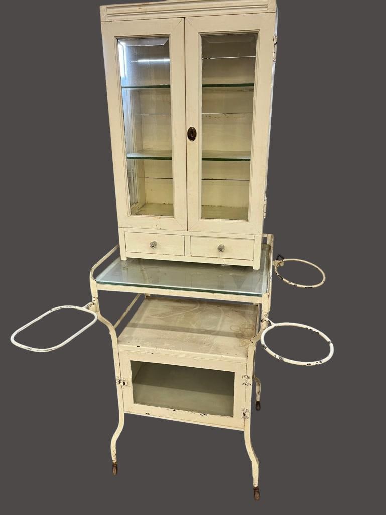 Medical Cabinet and rolling base: Wood Medical Cabinet and metal rolling base. 2 pieces. Cabinet approx. 31 x 20 x 11 inches. Base approx. 34 x 23 x 20 inches.