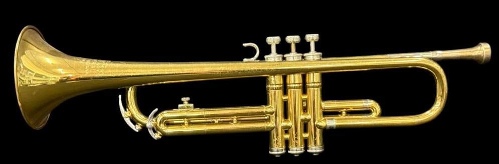 Martin Imperial Trumpet: Martin Imperial Trumpet. Serial # 702430. Approx. 22 x 6 x 4.75 inches..