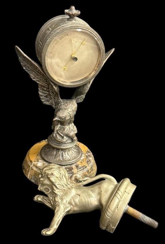 Lion hood ornament and Eagle Barometer: Lion hood ornament and Eagle Barometer. 2 pieces. Eagle approx. 8 x 4 x 4 inches.