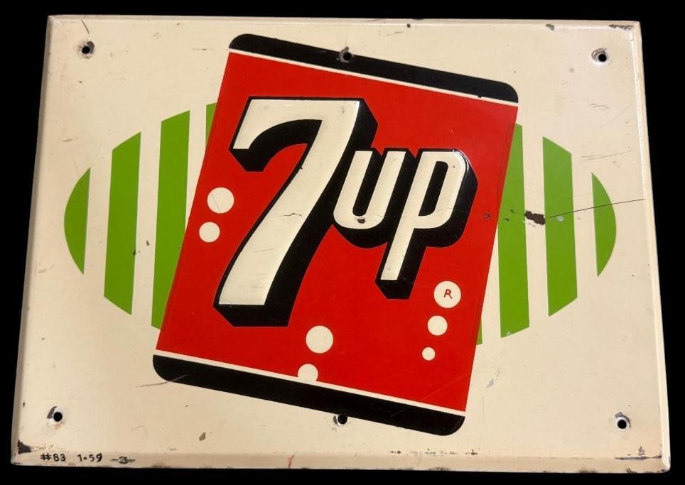 7 Up embossed metal sign: 7 Up embossed metal sign. Approx. 13 x 9.5 inches.
