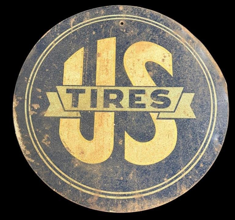 U.S. Tires round metal sign: U.S. Tires round metal sign. Approx. 18.75 inches.