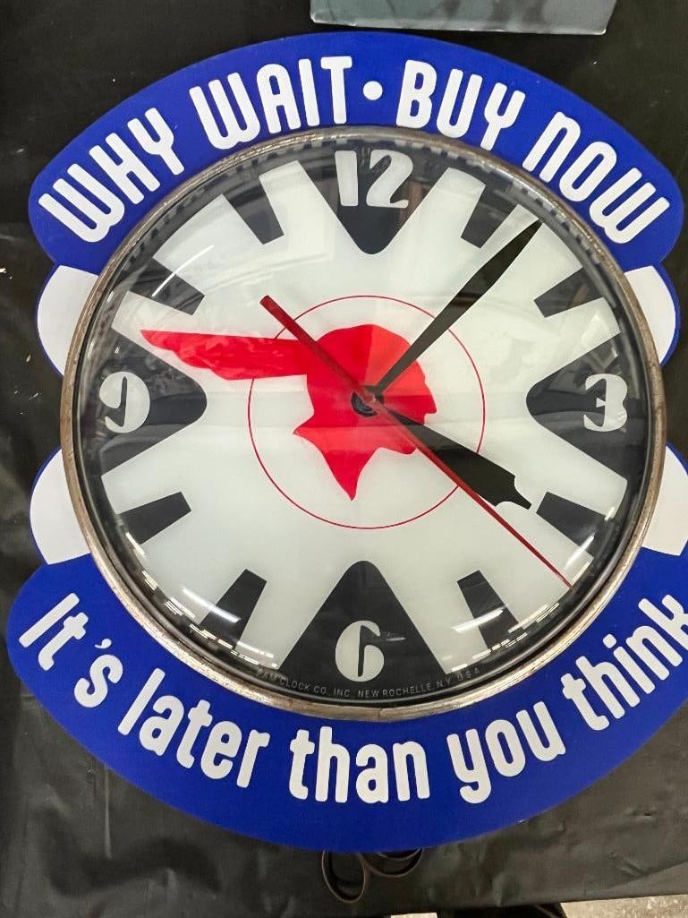 Pontiac Why Wait Buy Now lighted clock: Pontiac Why Wait Buy Now lighted clock. Made by PAM Clock Co. Approx. 21 x 17 x 4 inches.