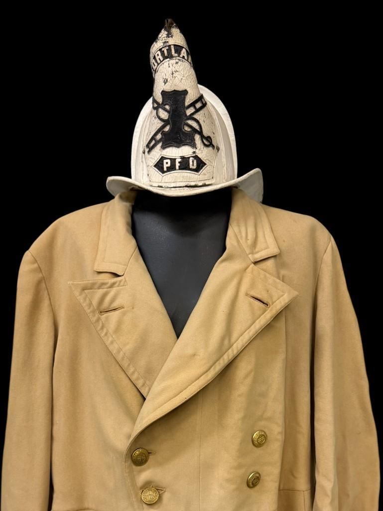 Cortlandt NY Fire Helmet and Coat: Cortlandt Peekskill NY leather Fire Helmet and Coat. Helmet approx. 9 x 15 x 10.5 inches.
