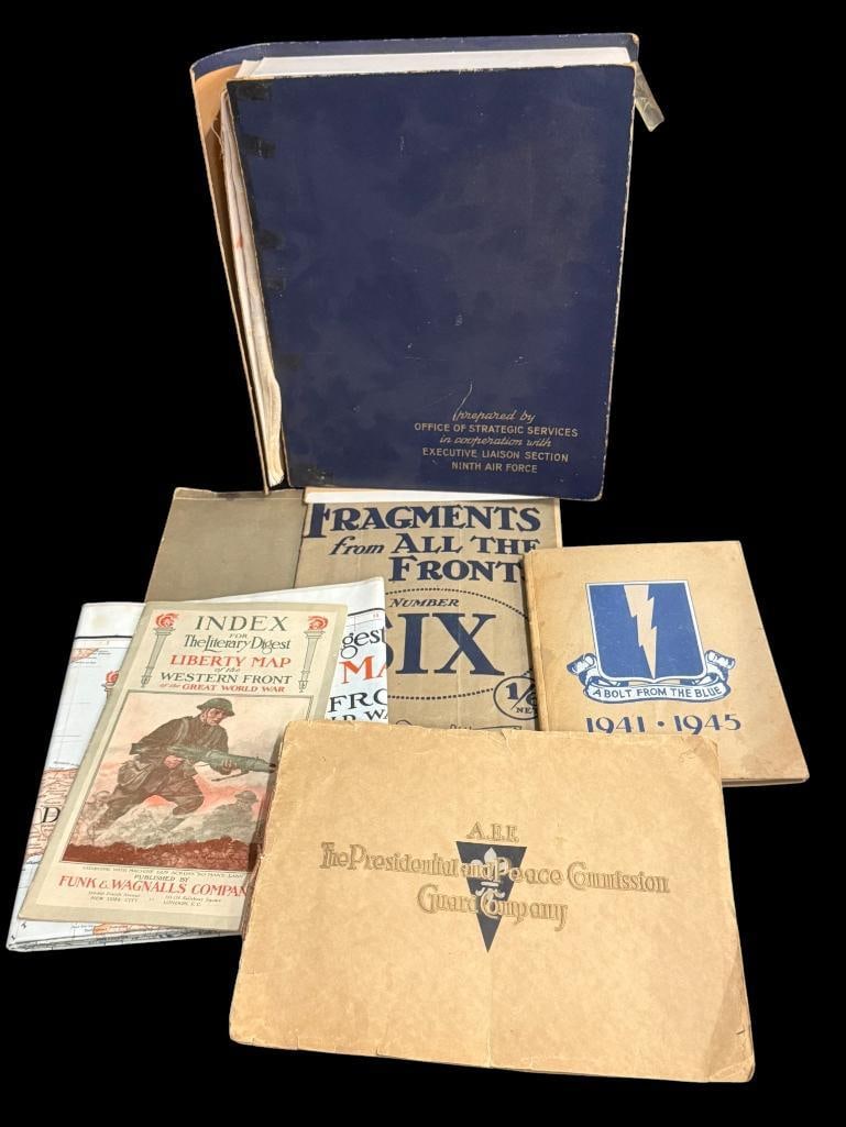 WW2 Ephemera: WW2 Ephemera including OSS binder, maps and unit histories. 7 pieces. Binder approx. 13 x 11 x 3 inches.