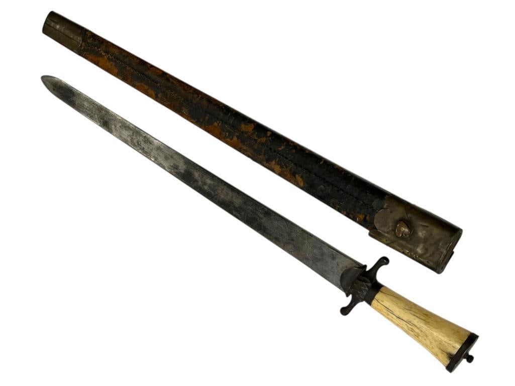 18th Century Austrian Hunting Sword: 18th Century Austrian Hunting Sword with bone handle and engraved blade. Approx. 31 inches.