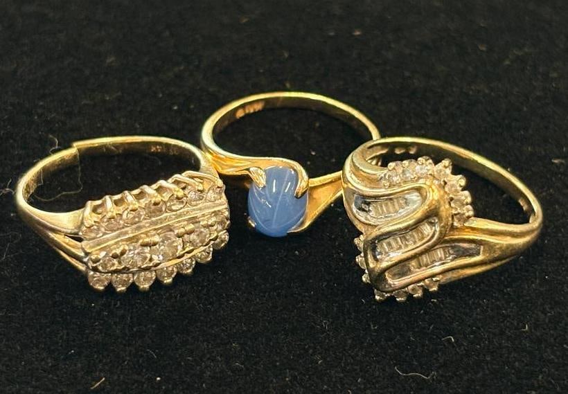 3 Gold rings with stones: 2 14k gold and 1 10k gold ring. Approx. 10.6 grams total.