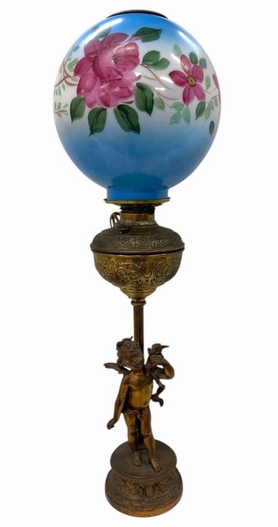 Victorian Cupid Figural Banquet Lamp: Victorian Cupid Figural Banquet Lamp with floral ball shade, approx. 32" h