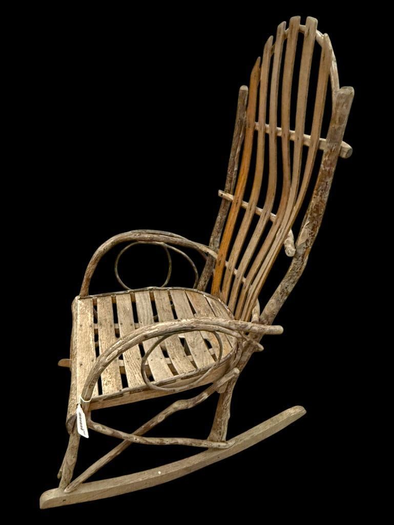 Bent Twig Adirondack Rocking Chair: Bent Twig Adirondack Rocking Chair. Approx. 44 x 23 x 34 inches.