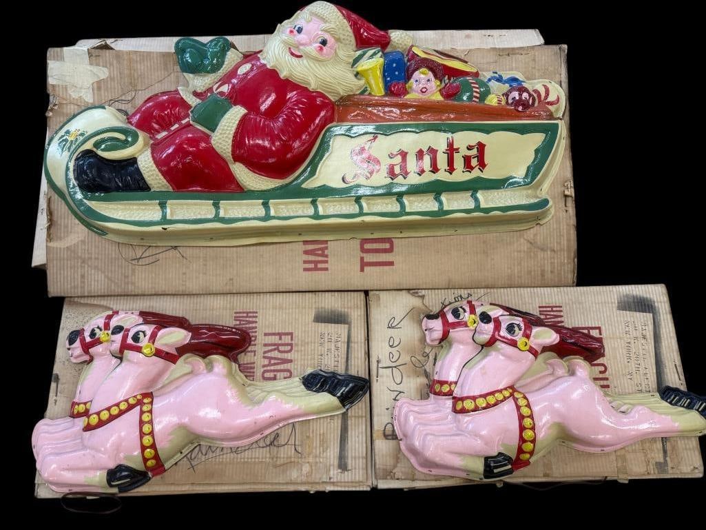 Vintage light up Santa with sleigh and 2 pairs of reindeer: Vintage Majestic Electric Mfg. Co. 3 dimensional light up Santa with sleigh and 2 pairs of reindeer, wall decorations. 3 pieces total. Santa approx. 44 x 20 inches. Reindeer approx. 24 x 15 inches.