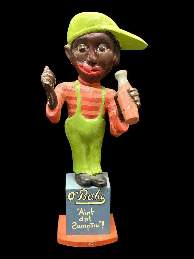 Duffy 1992 signed Black Americana wood carving: Duffy ( Bill & Phyllis ) 1992 signed Black Americana sculpture. O'Baby aint dat sumptin! Approx. 17 x 5 x 7 inches.