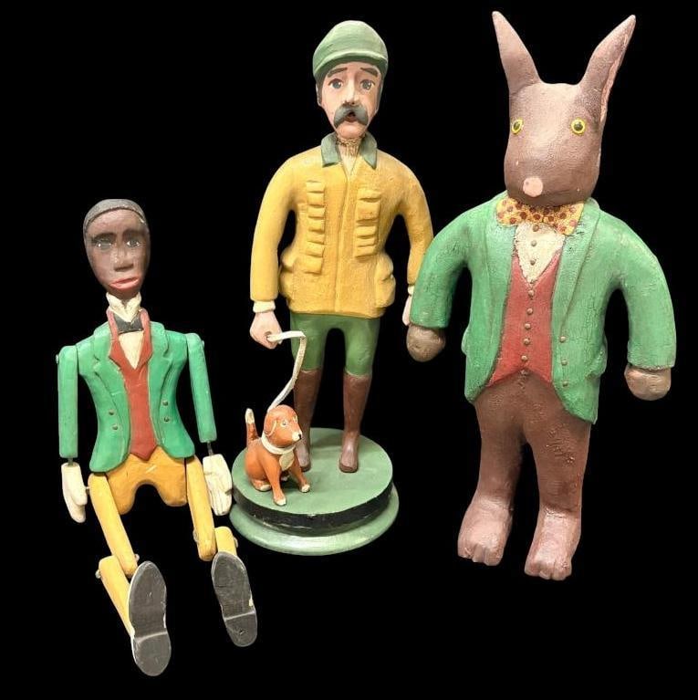 2 Duffy signed sculptures and hunter sculpture: 2 Duffy signed sculptures and hunter sculpture. Black Americana jointed figure and rabbit. Rabbit approx. 16 inches tall.