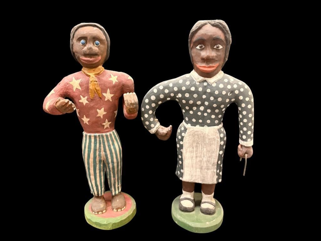 Bill & Phyllis Duffy signed Black Americana wood carvings: 2 Bill & Phyllis Duffy signed Black Americana sculptures. Man and woman. Approx. 18 x 5 x 5 inches.