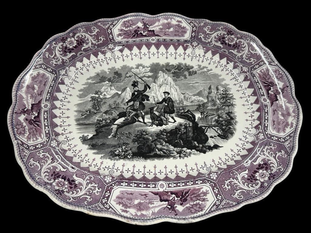 19th Century Caledonia pattern platter: 19th Century "Caledonia" pattern platter in mulberry and black transferware color scene. Approx. 20 x 16 inches.