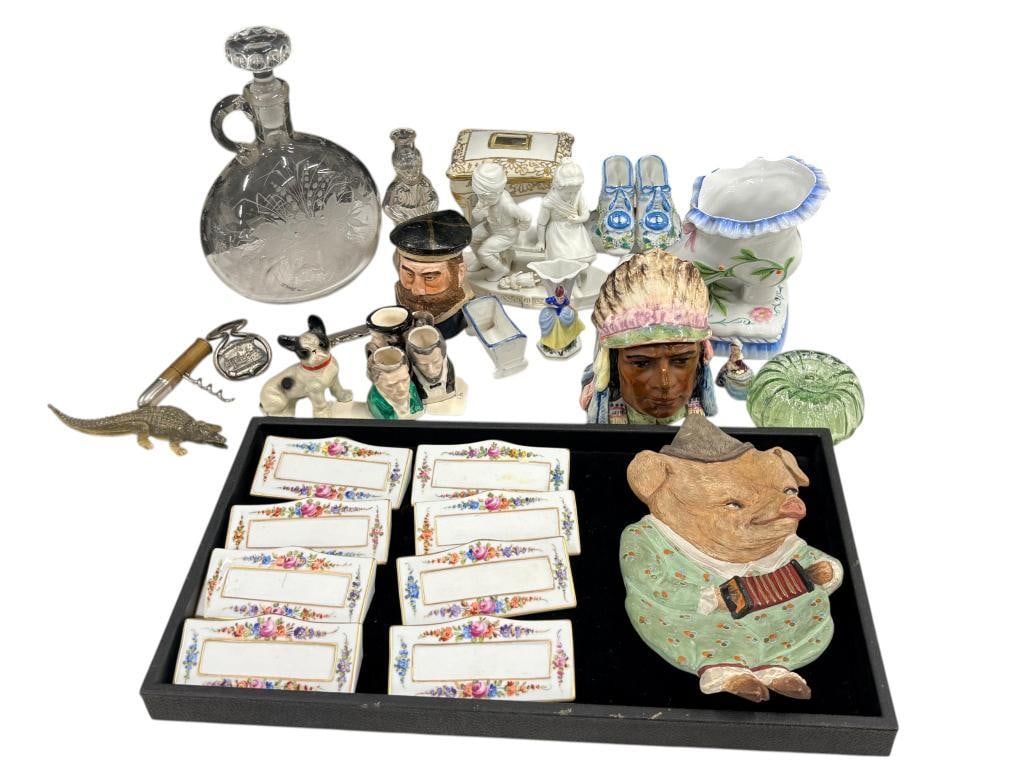 Dresden place card holders, toby mugs etc.: Dresden place card holders, toby mugs, cast iron dog, figurines and more. Approx. 28 pieces.