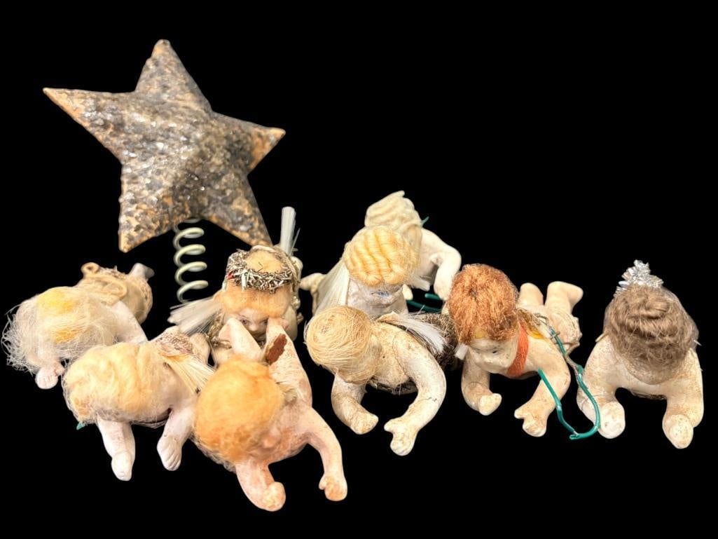 Porcelain angel ornaments and Star tree topper: Porcelain angel ornaments and Star tree topper. 10 pieces.