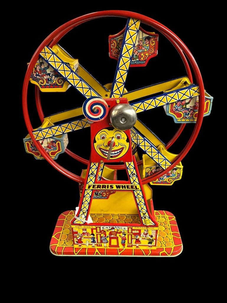 J. Chein & Co. tin litho wind up "Hercules" Ferris Wheel: J. Chein & Co. tin litho wind up "Hercules" Ferris Wheel. Approx. 17 x 11 x 6 inches.