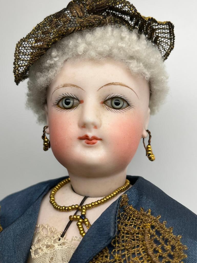 French Fashion porcelain doll: French Fashion porcelain doll. Approx. 14 inches tall.