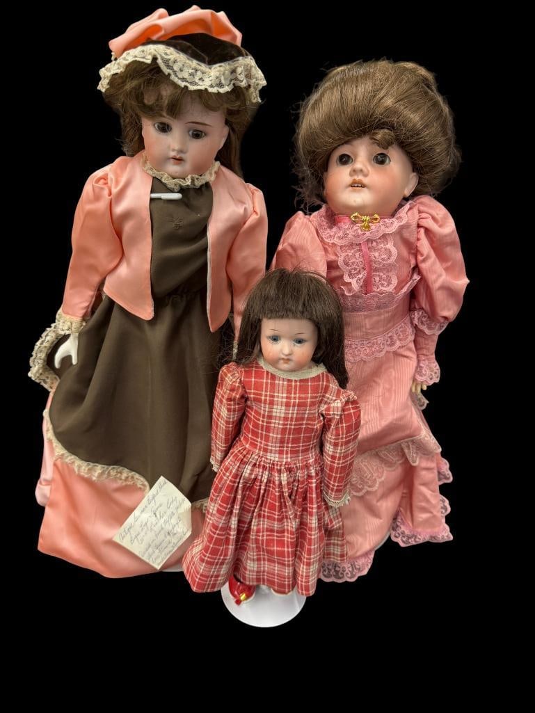 3 German Bisque dolls: 3 German Bisque dolls. One with bique legs and arms, leather body. Tallest approx. 19 inches.