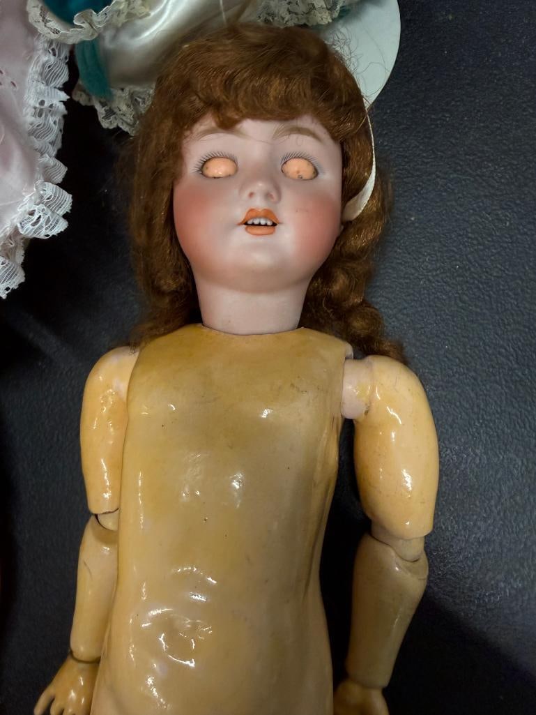 4 porcelain dolls - 4