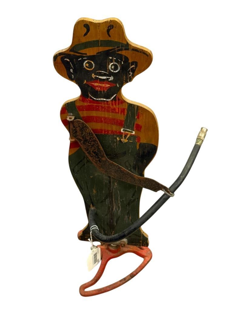 Sprinklin Sambo sprinkler c. 1930's: Sprinklin Sambo sprinkler c. 1930's. Approx. 27 x 8 x 8 inches.