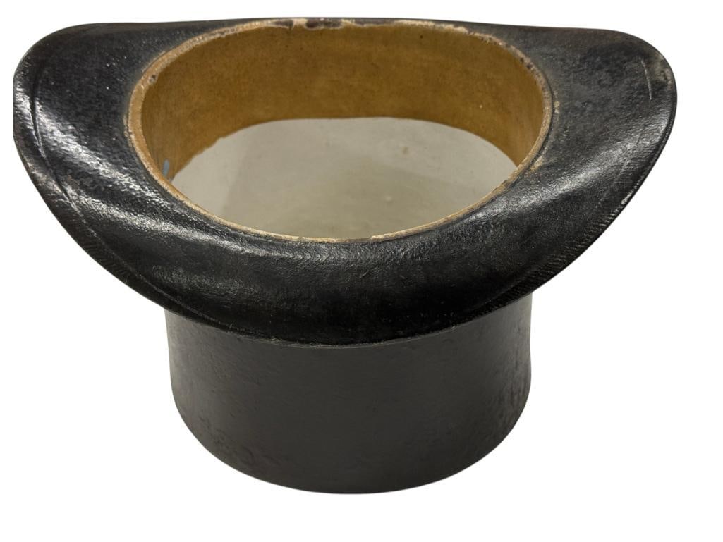 Cast iron Top Hat spitoon: Cast iron Top Hat. Approx. 7 x 11 x 9 inches.