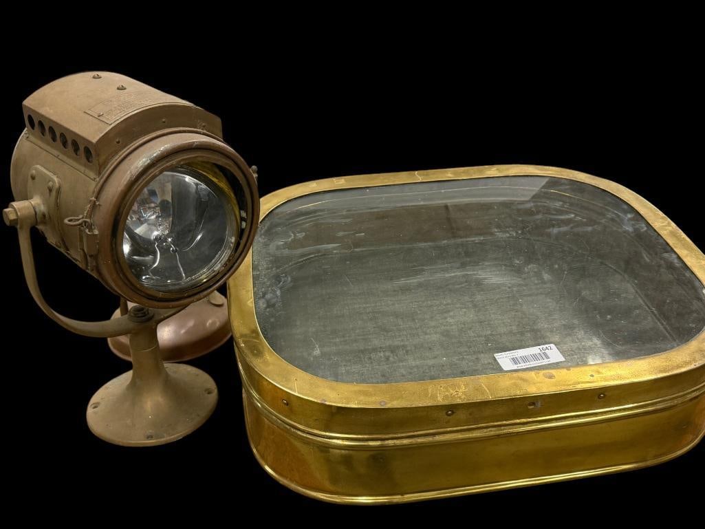 Brass display case and ship light: Brass display case and ship light. 2 pieces. Case approx. 8 x 23 x 18 inches.