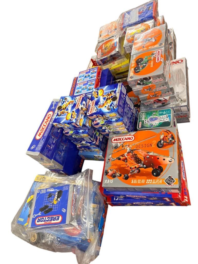Group of Meccano Toys most New in Box: Group of Meccano Toys Most are New in Box. Including Metal Robots, Eiffel Tower and more. Approx. 58 sets