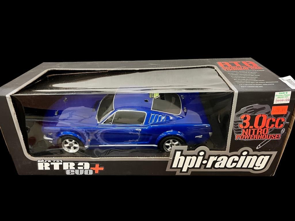 HPI Racing 1966 Mustang Nitro RS4 RTR 3 Evo: HPI Racing 1966 Mustang Nitro RS4 RTR 3 Evo remote control car. Box approx. 9 x 26 x 11 inches.