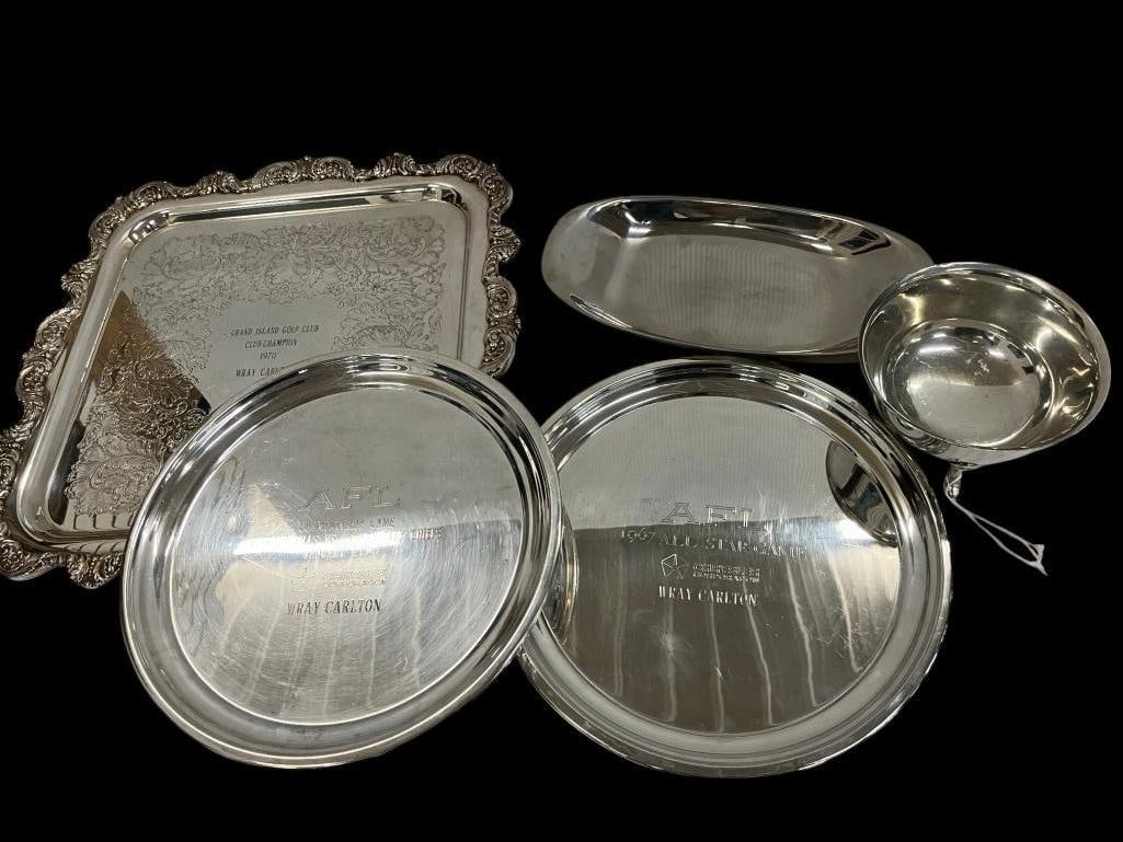 1967 AFL Buffalo Bills silver plated trays and more: 1967 AFL Buffalo Bills Championship Game silver plated tray, AFL All Star game tray, Grand Island Golf Club tray and more. 5 pieces. Golf tray approx. 18 x 18 inches.