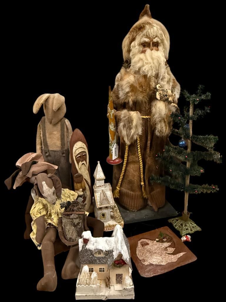 Santa Claus, rabbit figures, putz houses and more: Santa Claus, rabbit figures, putz houses and more. 9 pieces.