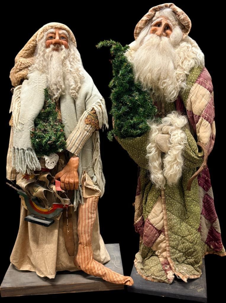 2 34 inch Santa Claus dolls: 2 34 inch Santa Claus dolls.