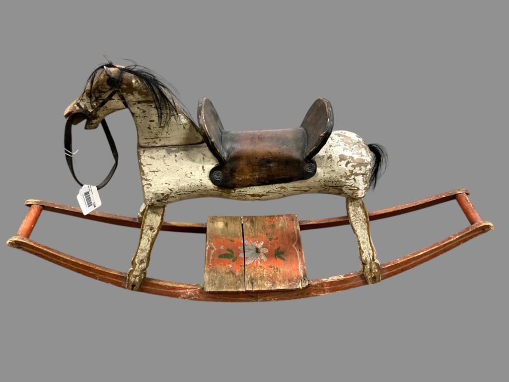 Antique wood rocking horse: Antique wood rocking horse. Approx. 24 x 46 x 12 inches..