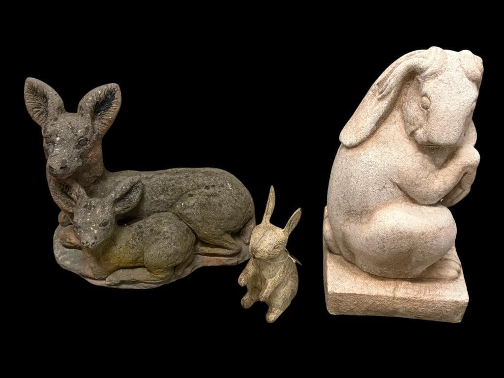 Rabbit and Deer concrete statues with rabbit bank: Rabbit and Deer concrete statues with rabbit bank. 3 pieces. Rabbit approx. 22 x 11 x 11 inches.