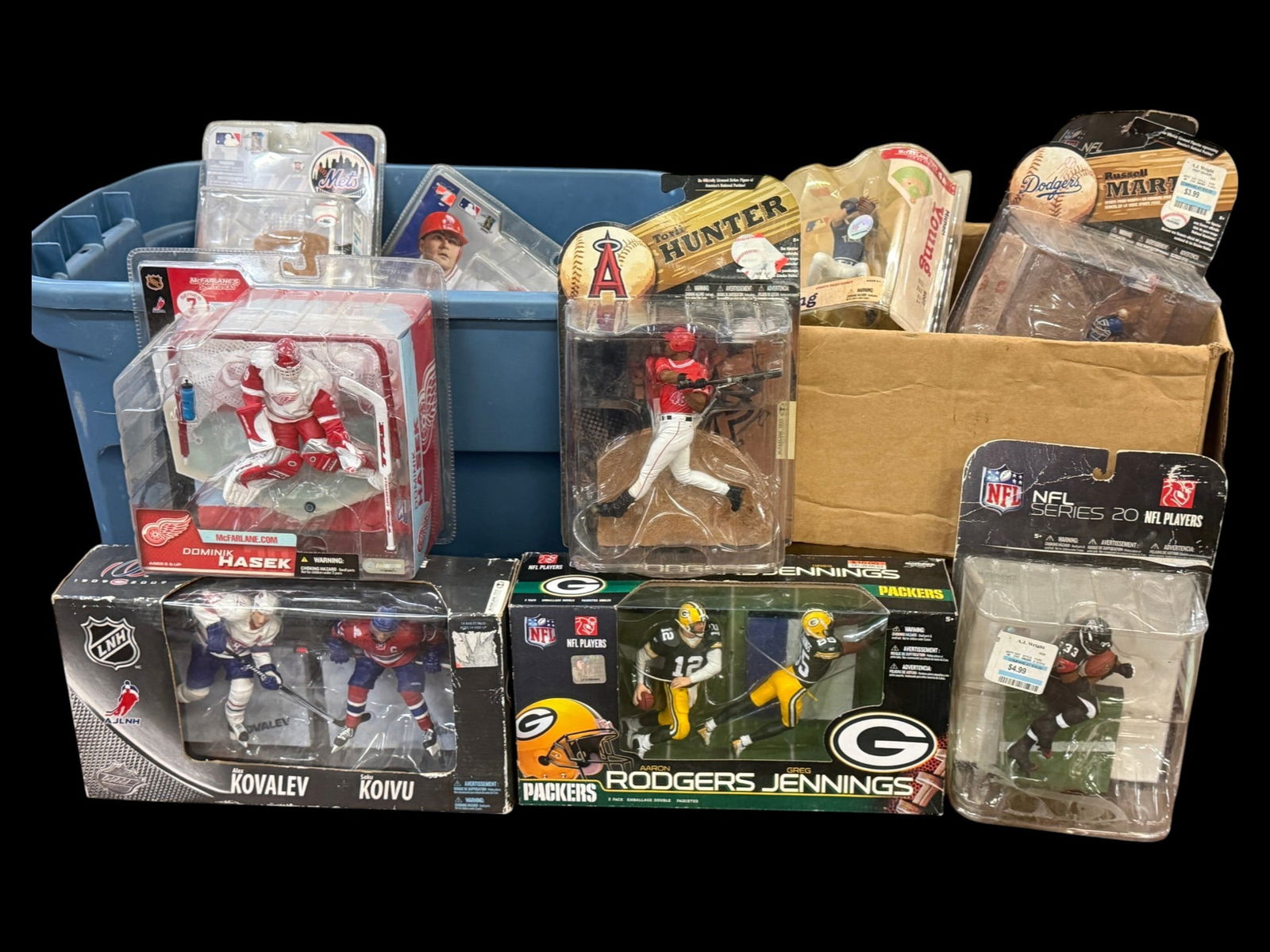 McFarlane Toys Sports Figures: McFarlane Toys Sports Figures. Baseball, Football and Hockey. Approx. 20 pieces.
