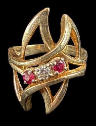 14k Gold Ring with Diamond and Ruby colored stones: 14k Gold Ring with Diamond and Ruby colored stones. Approx. 6.4 grams. Ring approx. size 7.