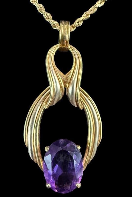 18k Gold and Amethyst Pendant with 14k Chain: 18k Gold and Amethyst Pendant with 14k Chain. 18k pendant approx. 13.2 grams. 14k chain approx. 7.5 grams. Total weight approx. 20.7 grams. Chain from clasp to pendant approx. 8.5 inches.