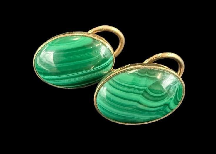 Malachite Earrings set in 14k Gold: Malachite Earrings set in 14k Gold. Approx. 7.9 grams.